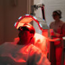 Man receiving red light treatment in Saraland AL for skin and muscle recovery